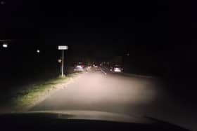 Street lights were off in Highfield Road with any lighting coming from cars' headlights