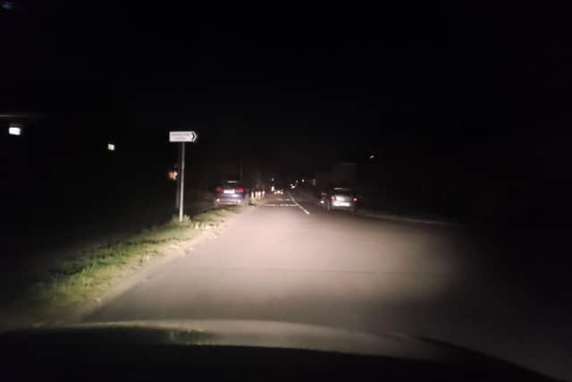 Street lights were off in Highfield Road with any lighting coming from cars' headlights