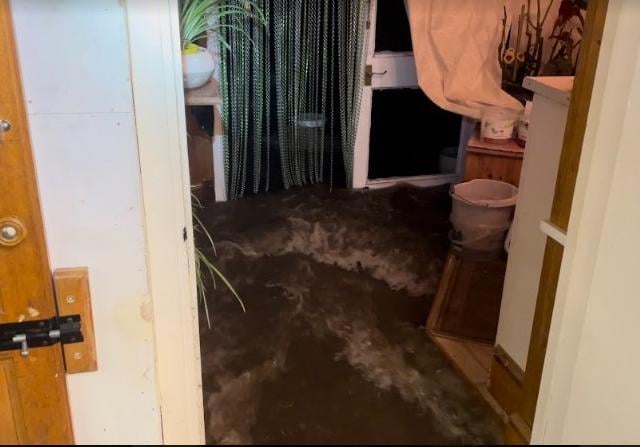 Flood water in a home in Waverley Road, Kettering - photo Dez Dell