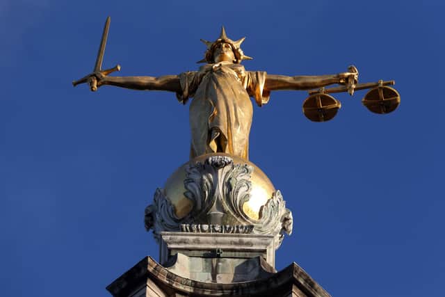 Statue of Justice on top of the Central Criminal Court building, Old Bailey, London/ File picture