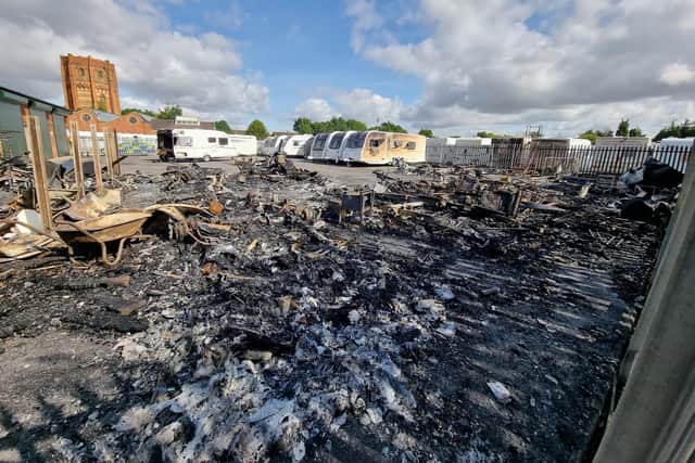 A commercial bin combusted in the workshop yard of The Caravan Company's lot