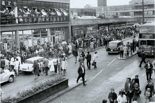 Traffic passes through Corporation Street in Corby in August 1972