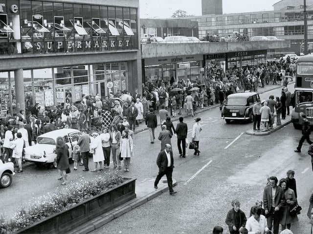 Traffic passes through Corporation Street in Corby in August 1972