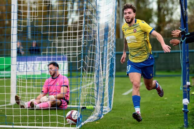 Will Jones celenrates scoring Wellingborough Town's second goal in their 3-1 win over Racing ClubWarwick on Saturday (Picture: Rib Wobb Photography)
