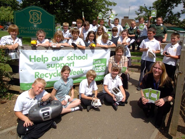 Great Doddington Primary School, recycling week, L-r front Ben Hewlett, Rebecca Swatton, Will Howes, Brooke Johnson, teacher Carys Burridge and Kirsten Jefferies June 2010