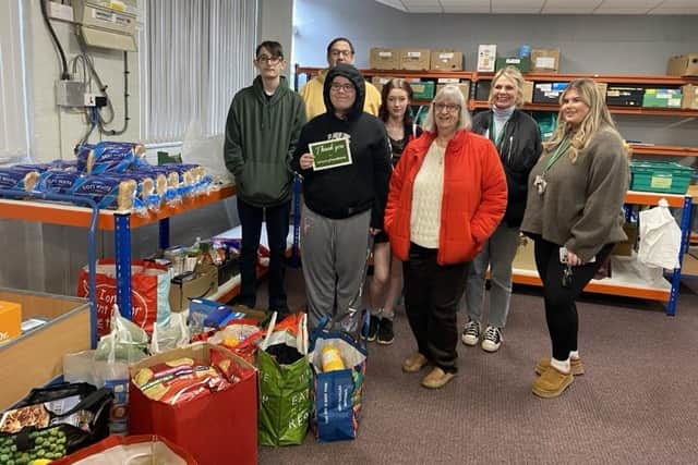 Pupils at Stone Lodge Therapeutic School based near Kettering deliver donations to Kettering Foodbank and Jane Calcott/UGC