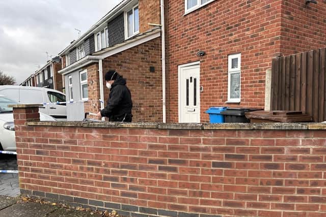 Officers on the scene of the stabbing in Eastbourne Avenue, Corby. Image: National World