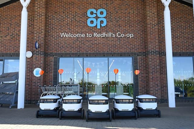 Robots lined-up outside Redhill's Co-op, Farm Road off Northern Way, Wellingborough
