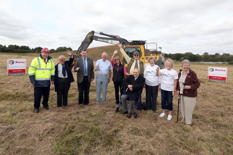 Rushden Lakes supporters with original Skew Bridge owner John Wills (seated) and contractor John Boyce (business development manager Barton Plant and The Bennie Group) in August 2014 with the old Skew Bridge site being cleared for work to begin