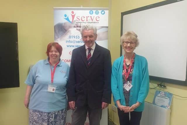 Julia and Joanne receiving a special thank you from Serve chairman Alan Armson