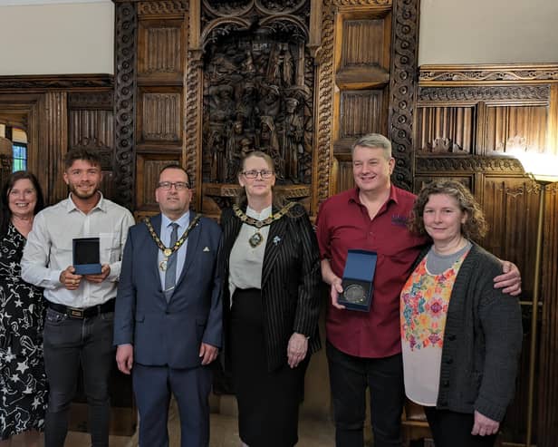Winners Todd Tompkins and Ian Griffiths alongside mayor Tracey Smith and the people who nominated them