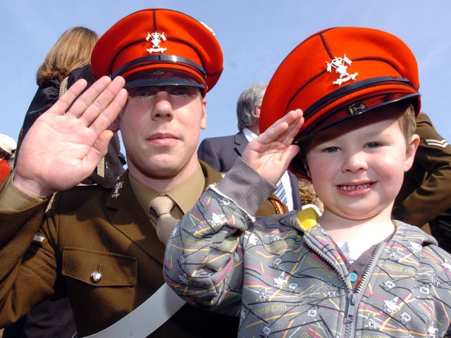 Northampton, 9th /12th Lancers (Prince of Wales's) homecoming parade after six-month tour of Iraq. 
Lance Cpl David Smith and his nephew Alfie Taylor, 4, from Rushden  
March 2009