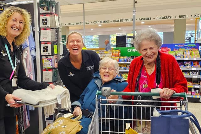 The wonderful store assistants who created joy for the residents.