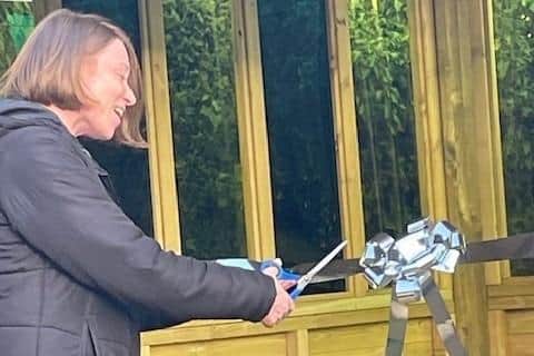 Mrs Liz Crofts (Former Executive Headteacher) cutting the ribbon to officially open the school’s outdoor classroom