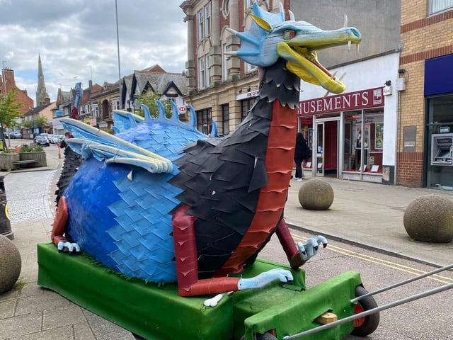 People attend Rushden's St George's Day market on Saturday