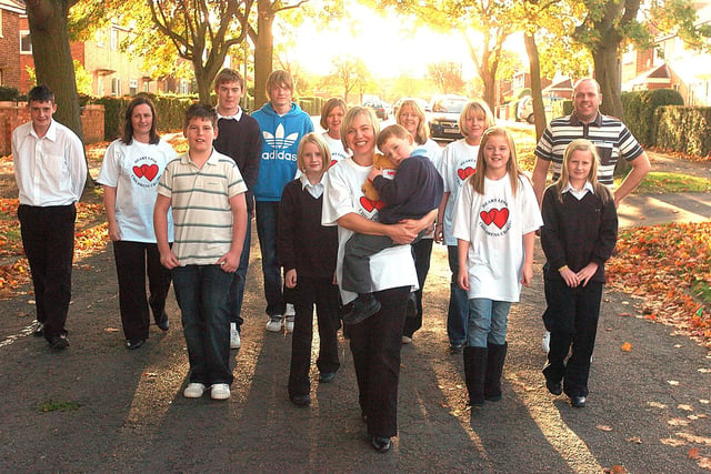 Four-year-old Owen Barron-Edgley and his mother Lorraine Barron-Edgley from Corby with friends who are all taking part in a sponsored walk to raise money for charity Heartlink
 October 2008