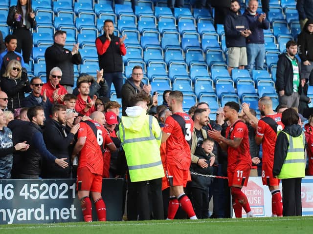 The Kettering Town players thank the travelling supporters after the FA Cup defeat at Chesterfield (Picture: Peter Short)