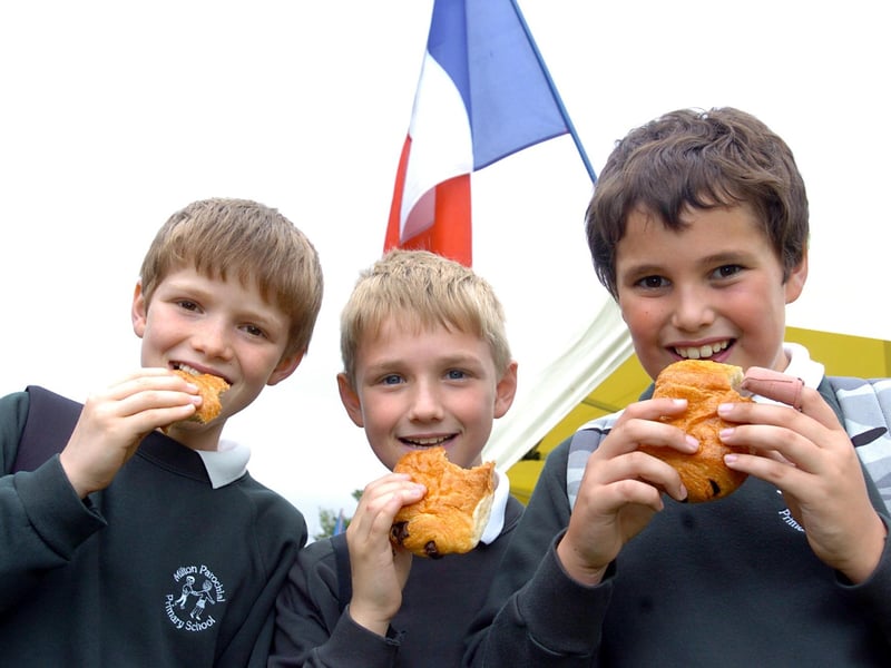 Tom Wykes, 11, Aiden Thomas, 10, Alex Jeffery, 11, from Milton School, Northampton, sample the pains au chocolat
