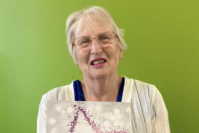 Sandy with her Diamond Slimmer award certificate (Pic credit: Slimming World)