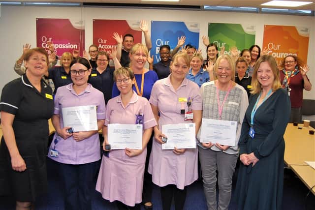 Carly, Corinna, Alexandra and Gwen (centre) with Jayne (far L) and Yvonne (far R) and colleagues.