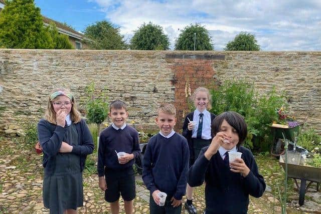 Pupils of Higham Ferrers Junior School taste the Pottage