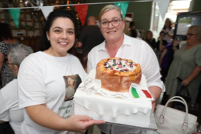 Cat Angieri with Paula Haynes and the pizza cake