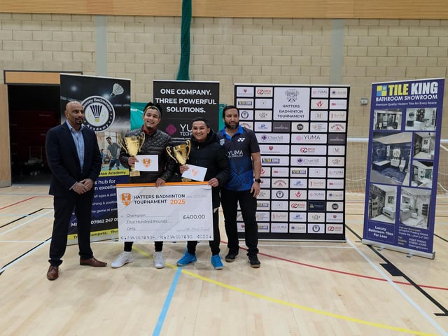 Winners and organisers pictured during the Hatters Badminton Tournament 2025, celebrating a successful day of competitive badminton.