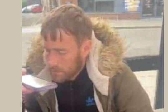 CCTV image of a man Northants Police would like to speak to after an incident in Kettering Horsemarket/Northants Police