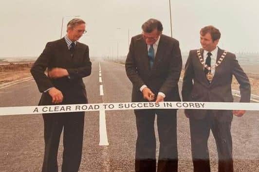Kelvin Glendenning (on left)  at the official opening of Steel Road with mayor of Corby George Crawley (on right)