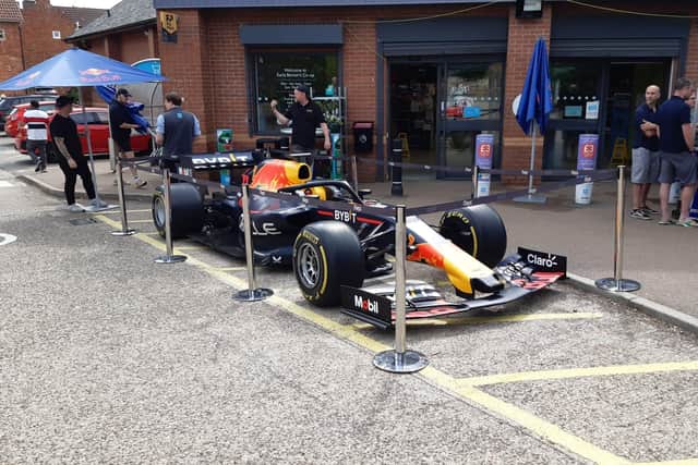 Red Bull F1 Team has made an appearance at the Earls Barton Co-op