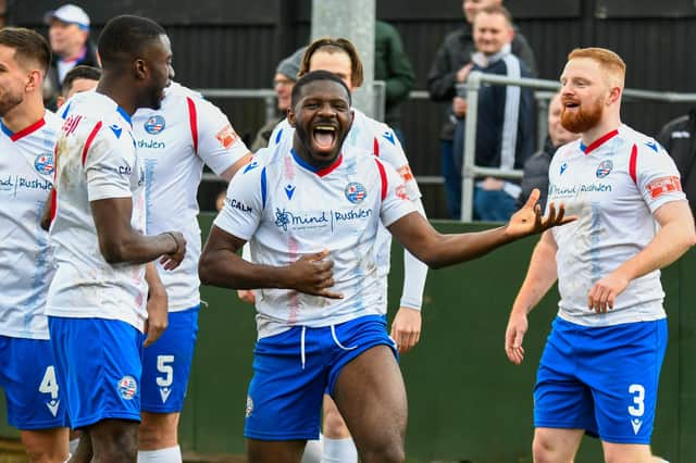 Nathan Tshikuna celebrates after he scored a penalty during AFC Rushden & Diamonds' 3-3 draw with Leiston last weekend. Pictures courtesy of Hawkins Images