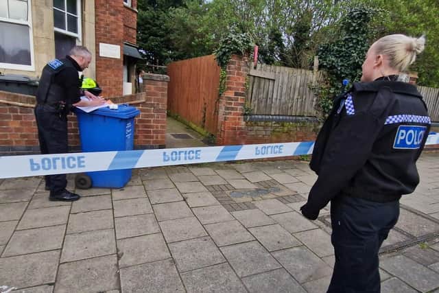 Police at the scene in London Road, Kettering