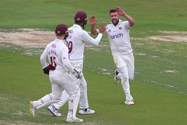 Simon Kerrigan celebrates after claiming the key wicket of Lancashire opener Keaton Jennings