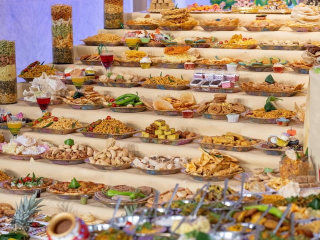 The sanctified food was distributed among volunteers and worshippers, in keeping with the community spirit of Diwali