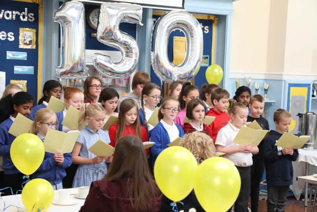 The Alfred Street School choir sings for guests at the 150th anniversary celebrations in March 2022