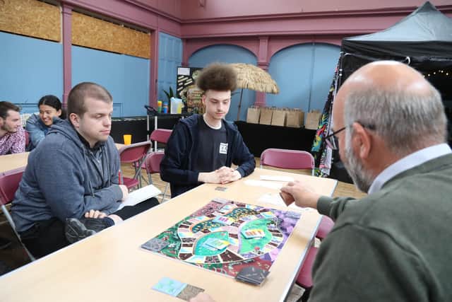 Playing the board game l-r Ashley Grant and Ebony Taylor