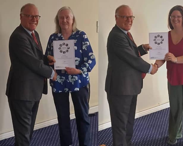 Sue Walters left and Sarah Nugent right receiving their awards from James Saunders Watson Esq
