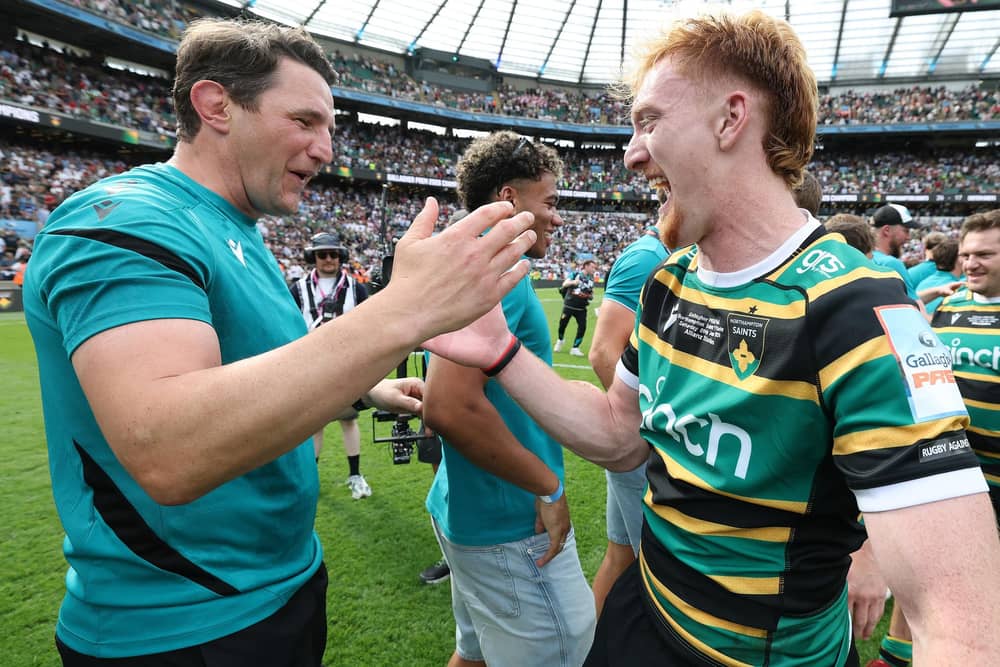 Phil Dowson celebrating with George Hendy after last season's Gallagher PREM final win (photo by David Rogers/Getty Images)