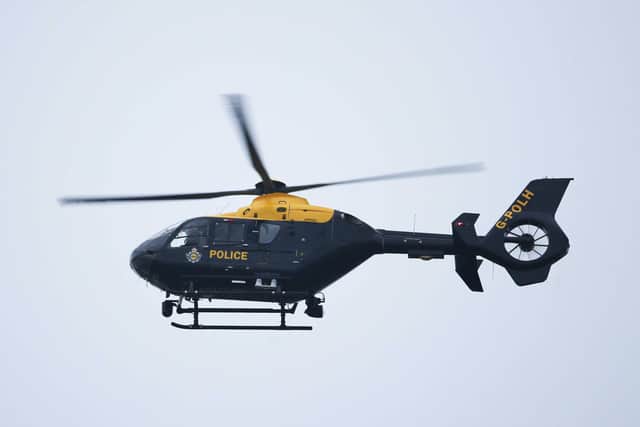 A National Police Air Service helicopter was hovering over Kettering and Rushden last night