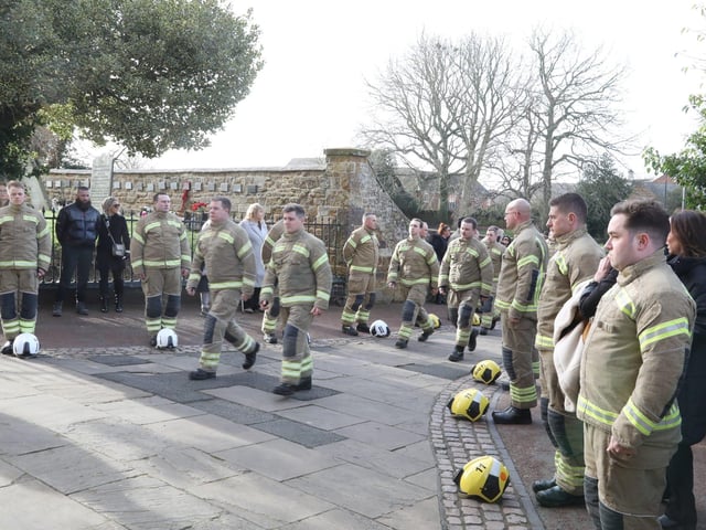 Firefighters enter the church