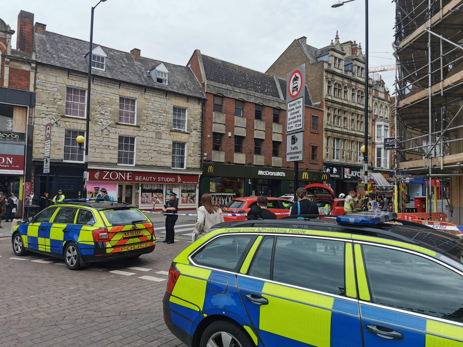 The scene in Northampton town centre today (Tuesday) as police and bomb squad units deal with "suspicious object" found in doorway near Market Square