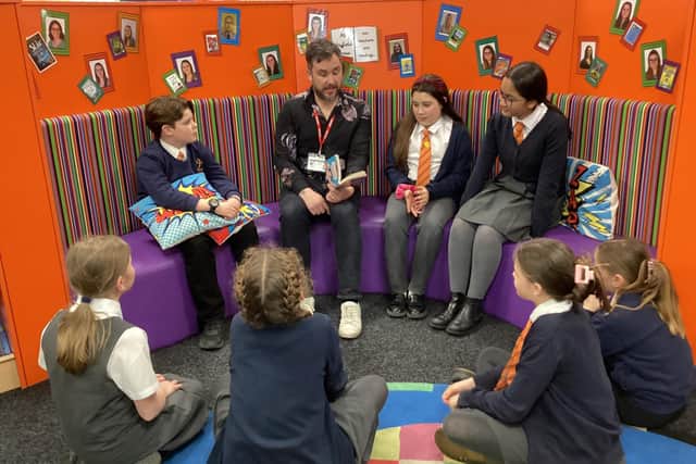 Ben Davis talks to pupils at Hayfield Cross /Hayfield Cross Primary School