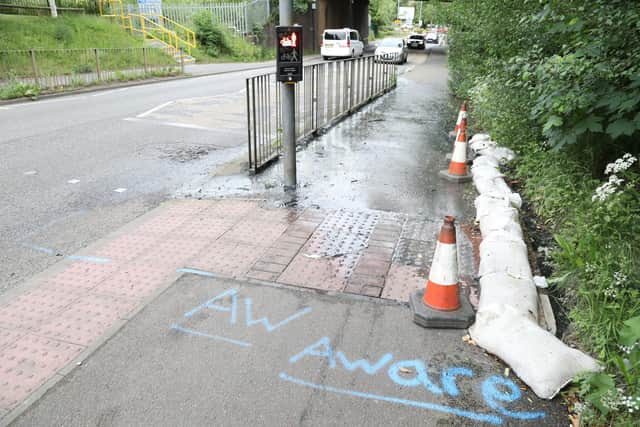 Sewer pipe water on the pavement used by many to get to Kettering General Hospital