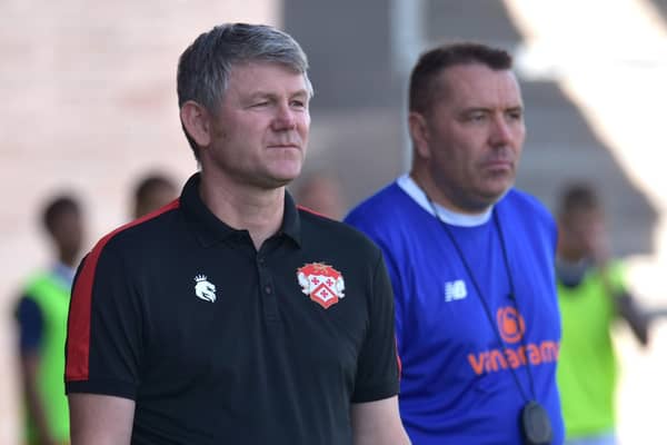 Lee Glover and assistant-manager Rory Prendergast watch on during Kettering Town's opening-day defeat at AFC Fylde. Picture by Paul Cooke/Poppies Media