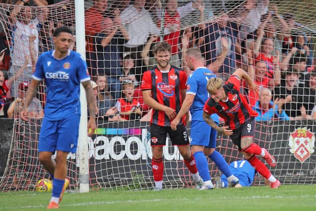 Eddie Panter runs away to celebrate after completing his hat-trick (Picture: Peter Short)