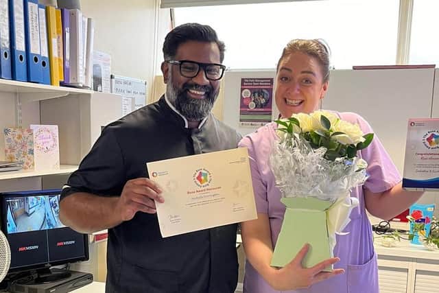 Michelle receives her award from Prof Ganesh Baliah