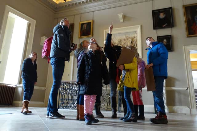 Families enjoying a trail in the North Hall at Stowe House