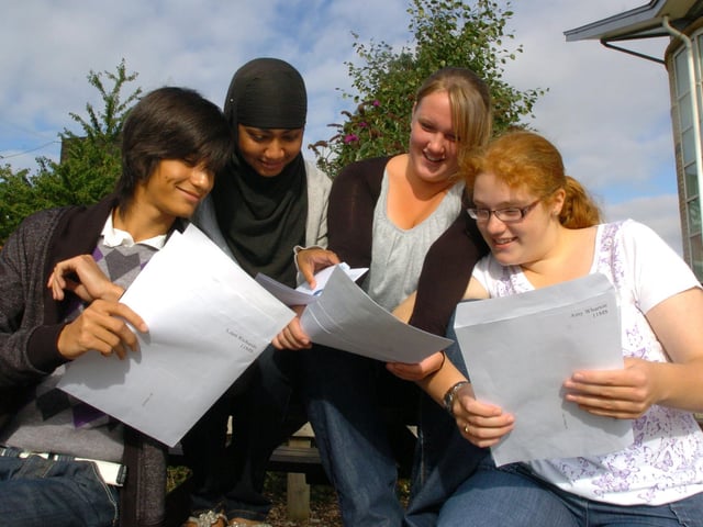 Liam Richards, 16, Nadia Azad, 16, Sophie Howe, 16, and Amy Wharton, 16, check out their GCSE results, 2009