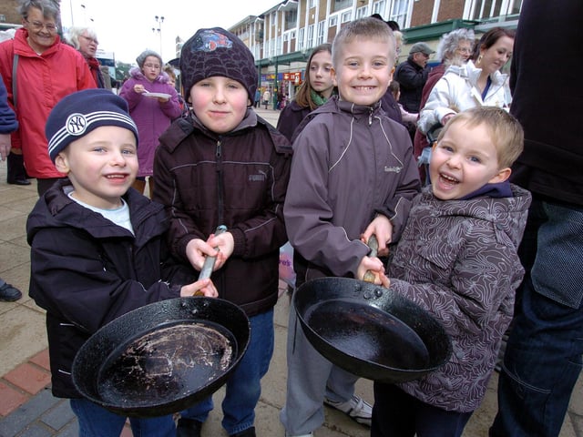 Corby, town centre, pancake races organised by Corby Radio l-r Aidan Brown, 5, Dylan Philip, 8, Phillip Tondeau-Cordwell, 9, Owen Cordwell, 5, 2010