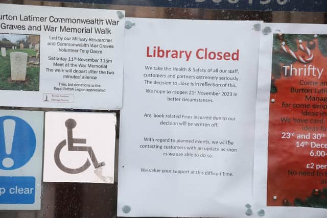 A closure notice has been placed on the library's door.